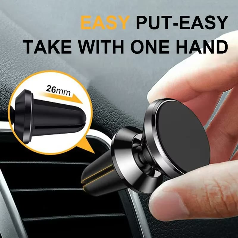 The black magnetic mount clipped into a car air vent, lifted away between two fingers, with the 26mm clip depth called out