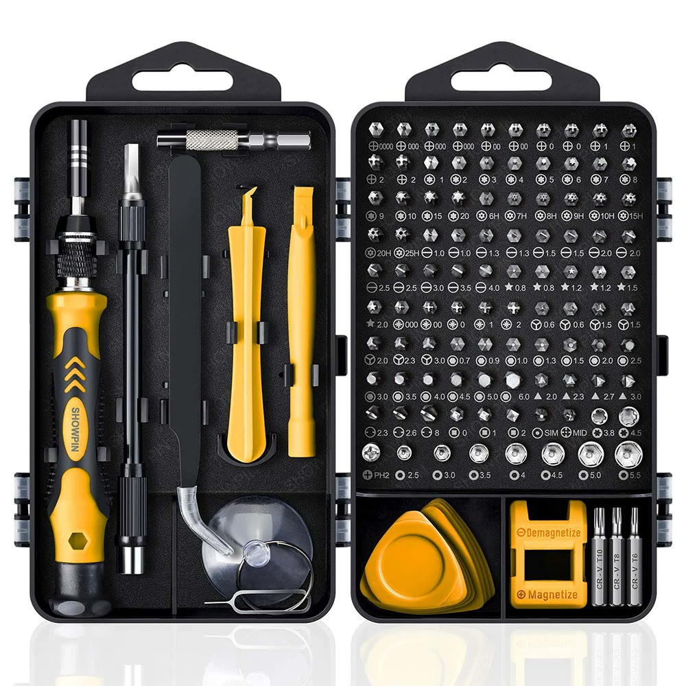 The open yellow and black case, handle and extension shaft on the left, a full tray of labelled bits on the right