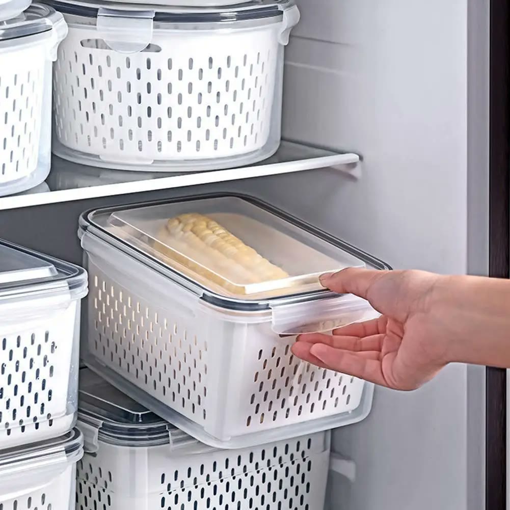 A keeper being slid onto a fridge shelf one-handed by the moulded side grip